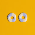 Orecchini a ciambella fluttuanti