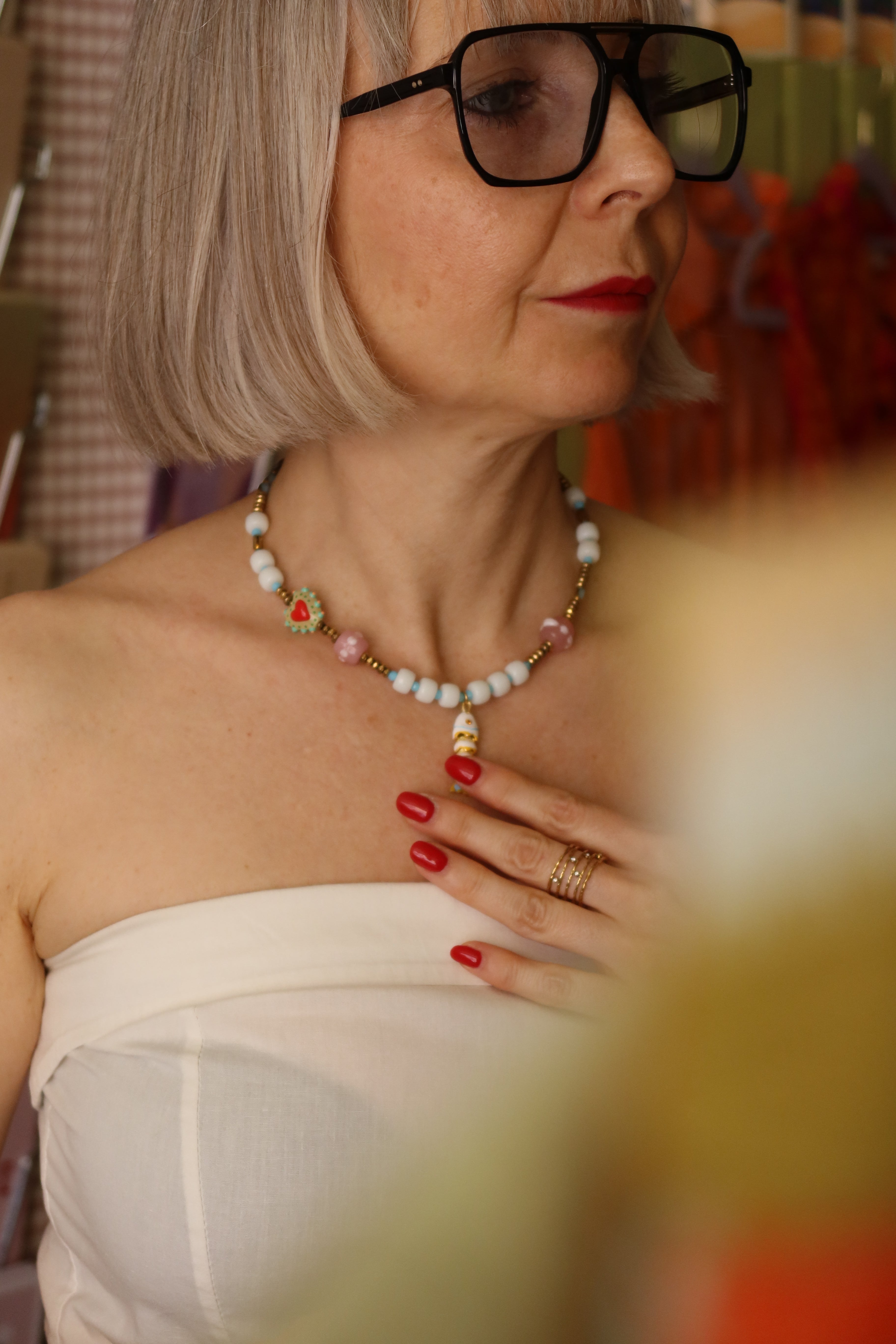 Collana con ciondolo a forma di pesce
