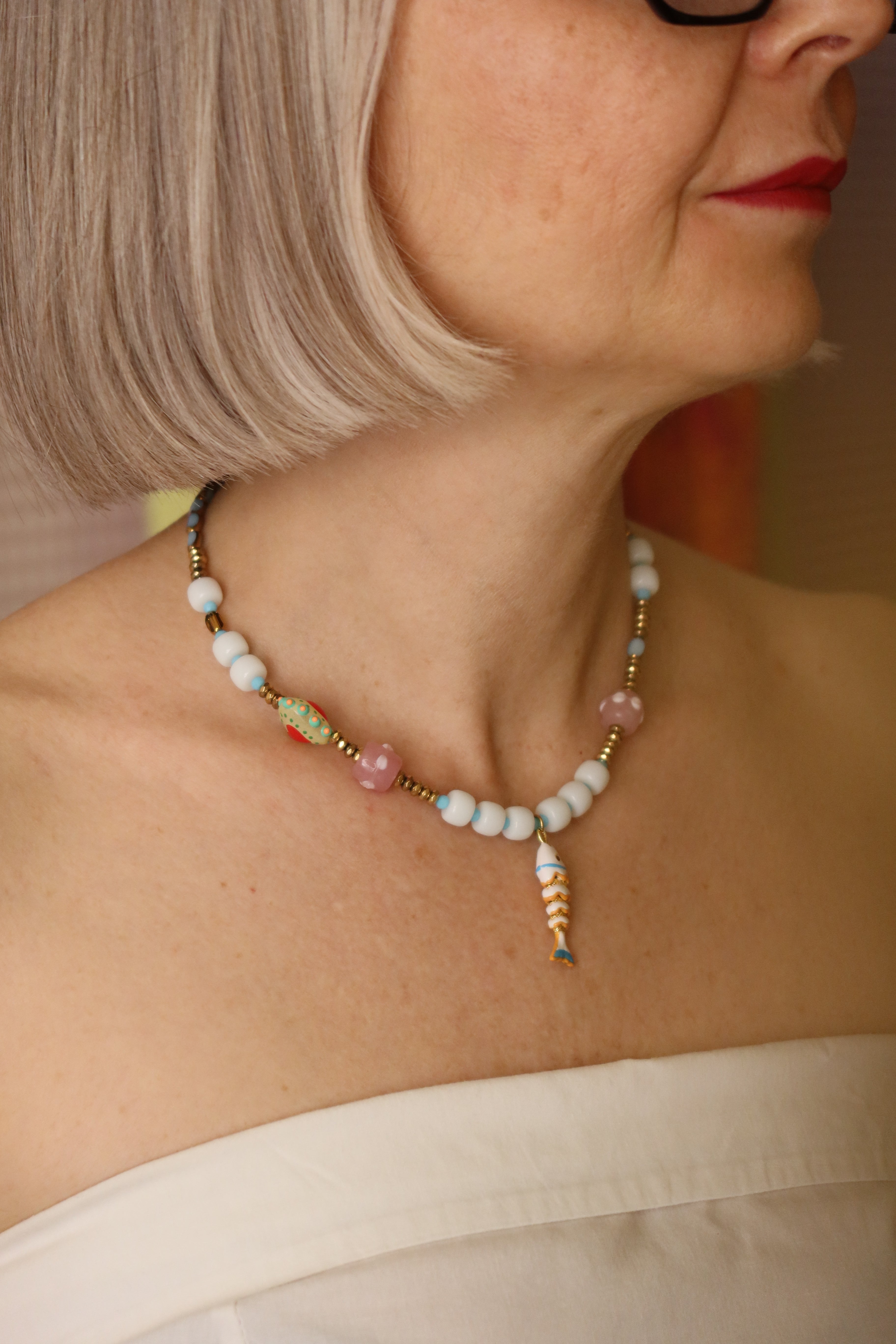 Collana con ciondolo a forma di pesce