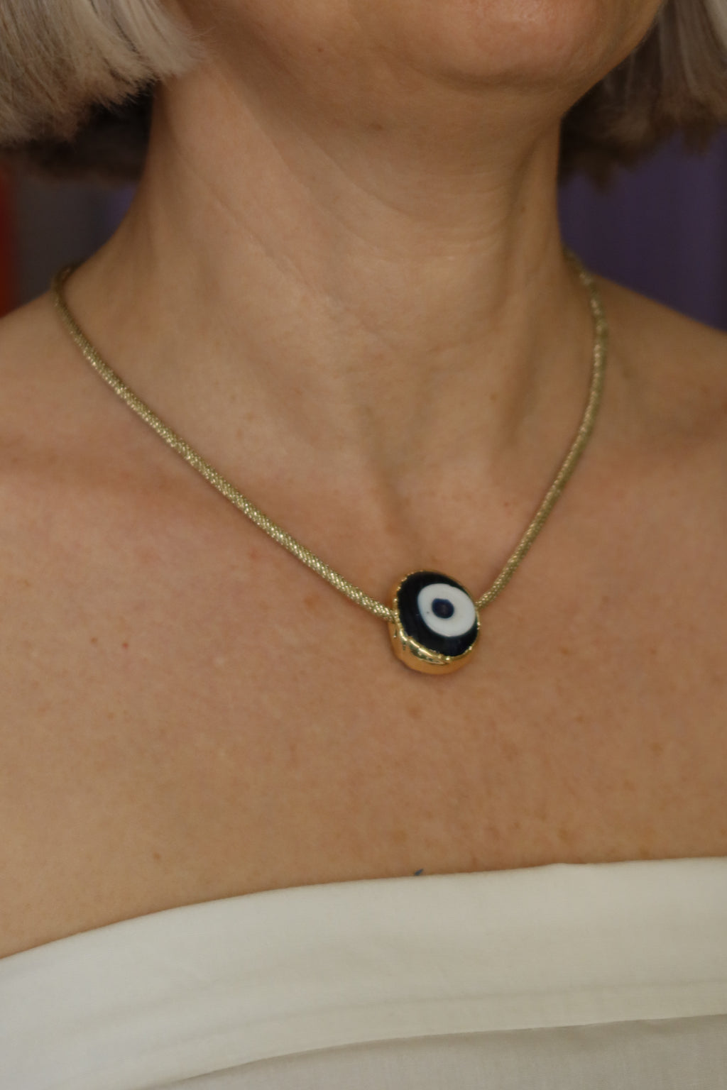 Collana girocollo su cordoncino dorato
