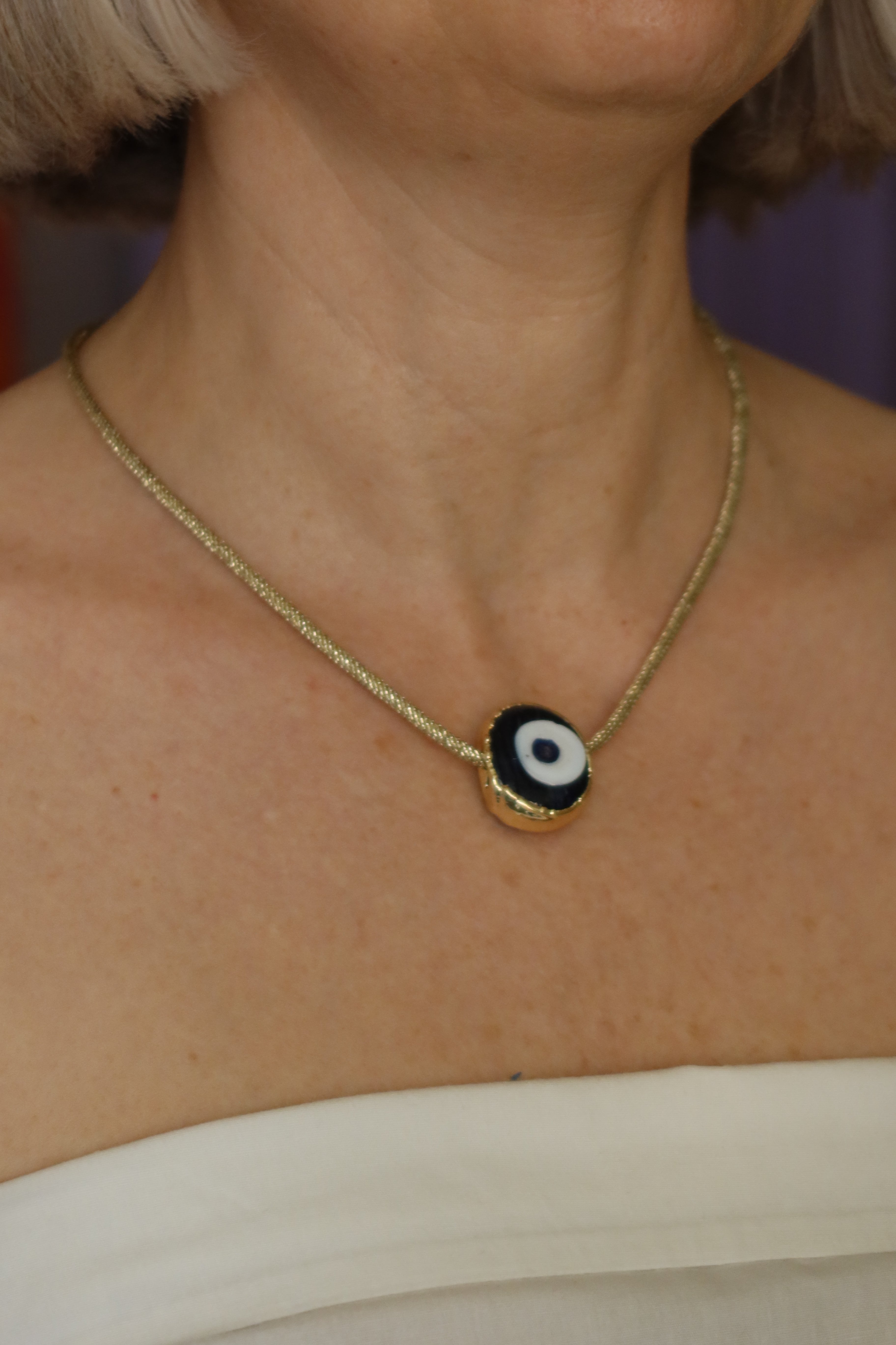 Collana girocollo su cordoncino dorato
